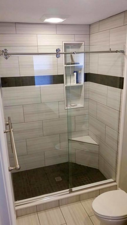frameless glass shower door with silver handle